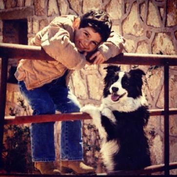 Juan as a child with Boots the Border Collie who inspired Barney and Boots